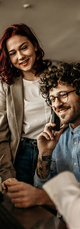 Remote Working Solutions Three colleagues working together with remote working solutions