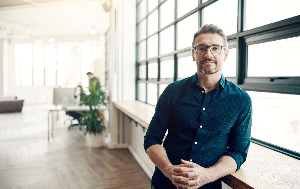 Online Marketing For Small Business A portrait of a man working in online marketing specialized in small businesses