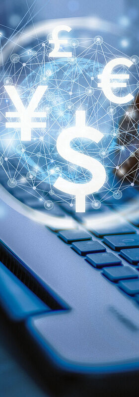 SOC Services - Lower costs Two hands type on a laptop with various currency symbols hovering above it to visualize the cost savings from T Business's SOC services.