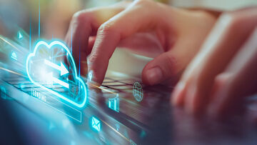 Small Business Security Person searching for small business security on their laptop