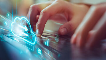 Small Business Security Person searching for small business security on their laptop