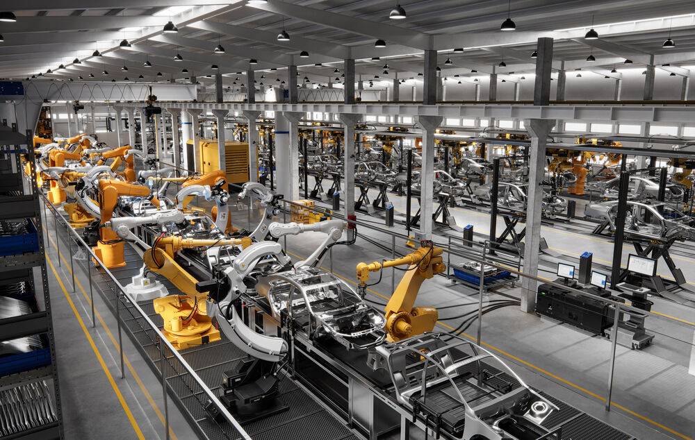 Cars on production line in a factory managed with IT solutions for enterprises