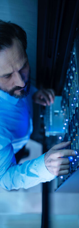 Hospitality IT Solutions A man searching for hospitality IT solutions on his screen