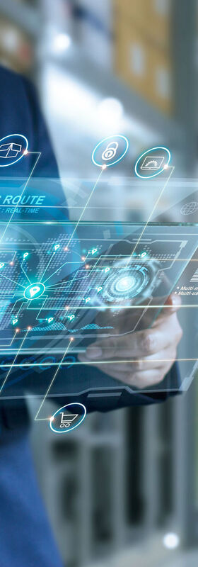 Security risks A businessman holds a virtual interface panel to visualize how business services from T Business can be used to identify security risks.