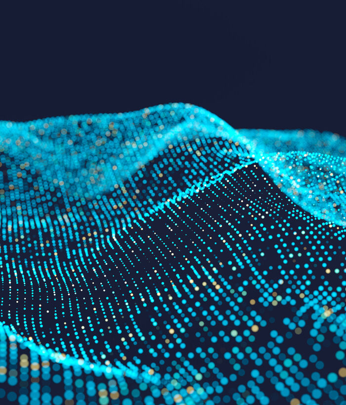 An abstract background of glowing blue particle landscape visualizes big data analytics with digitalization by T Business.