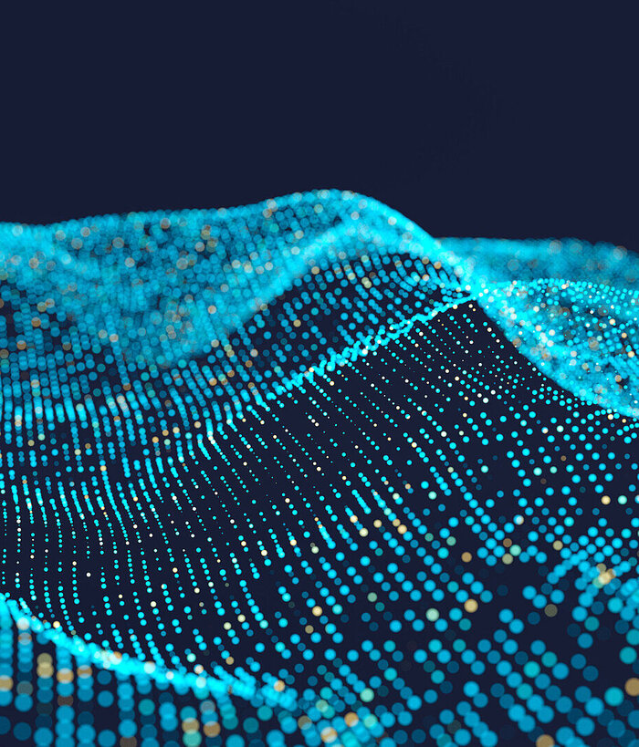 An abstract background of glowing blue particle landscape visualizes big data analytics with digitalization by T Business.
