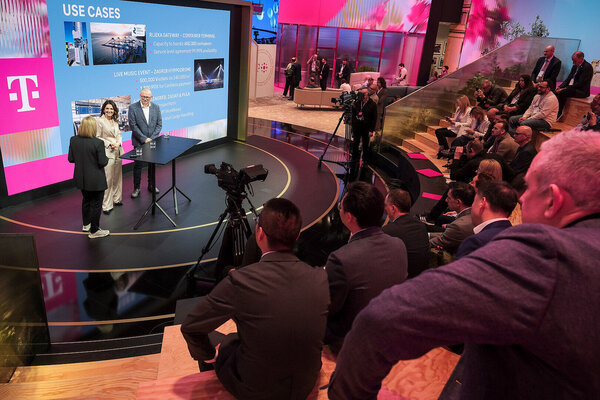 5G Campus Networks Marijana Bačić, Marin Tica and Mirela Seserko on a stage discussing about use cases of smart airports at the Mobile World Congress (MWC) 2026.