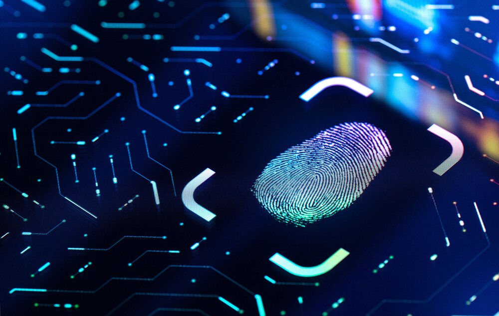 IT security A glowing fingerprint on a stylized circuit board symbolizes enterprise IT security solutions by T Business.