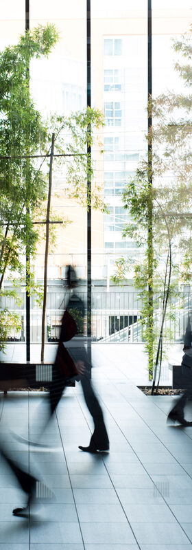 Business people walking in a smart city