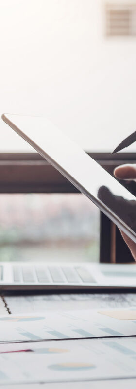 People working together on a project for banking and financial solutions with there laptops