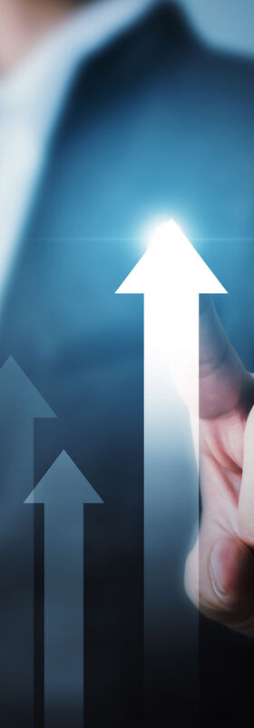 Next Generation Hybrid Data Center An index finger touches the tip of an arrow pointing upwards showing more efficiency and less costs with the next generation hybrid data center, T Business solution.