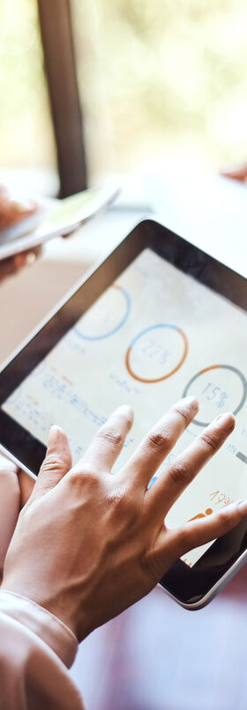 Secure Connectivity People working with mobile devices connected with secure connectivity services by T Business.