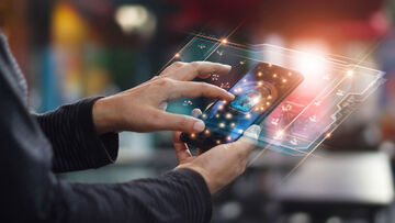 Data security Hands touch a digital padlock icon on a smartphone to illustrate how targeted awareness training with T Business data security solutions can reduce and even eliminate security risks.