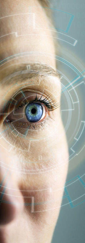 Security risks A woman looks at an augmented reality display to identify security risks using T Business solutions.