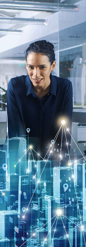 Small Business Communication Platform Business partners standing above a digital map enabled by the communication platform from T Business.
