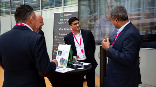 Digital Transformation of Manufacturing Industry Four men discussing at Digital Transformation of Manufacturing Industry