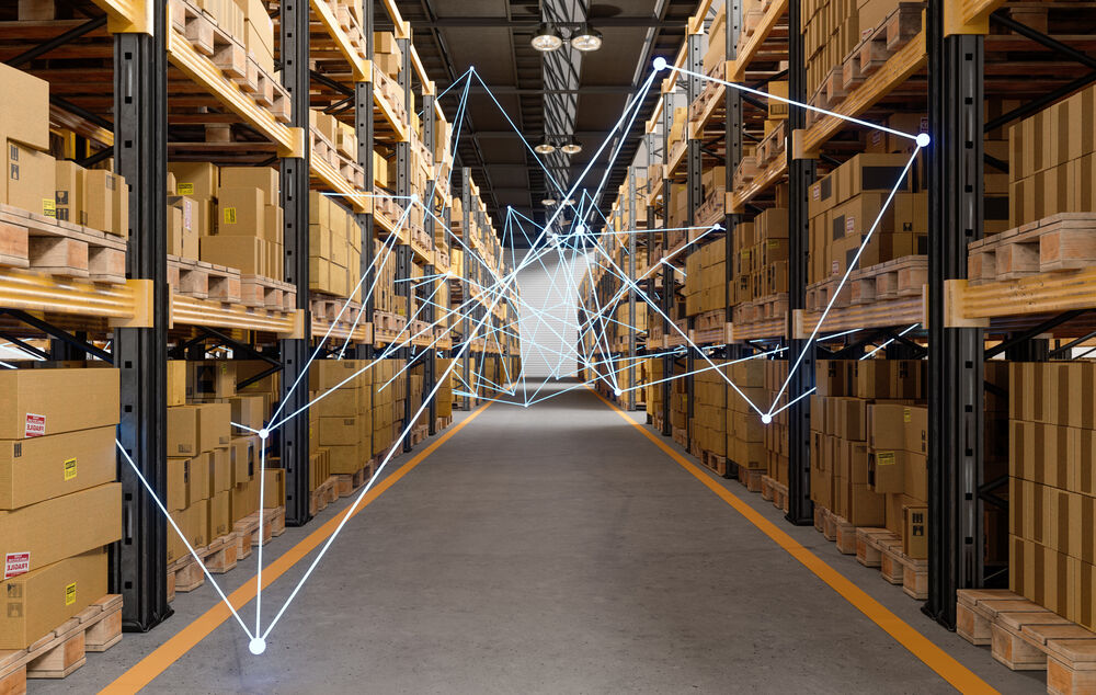 Connectivity solutions A stylized communication network is depicted in a warehouse, symbolizing the connectivity solutions of T Business.