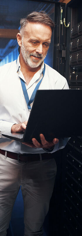 Logistics IT Solutions A business man looking for logistics IT solutions in his laptop