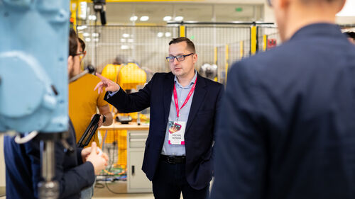 Digital Transformation of Manufacturing Industry A speaker explaining his topic to the crowd at Digital Transformation of Manufacturing Industry