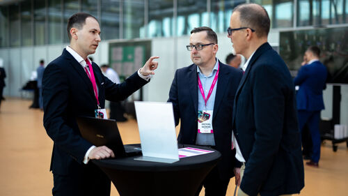 Digital Transformation of Manufacturing Industry Three men discussing at Digital Transformation of Manufacturing Industry