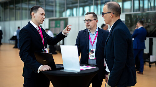 Digital Transformation of Manufacturing Industry Three men discussing at Digital Transformation of Manufacturing Industry