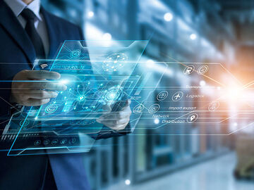 A man holds a tablet on which he is searching for banking and financial solutions