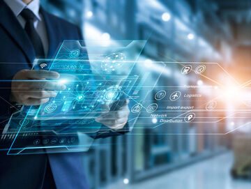 A man holds a tablet on which he is searching for banking and financial solutions