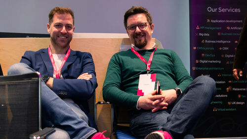 Digital Transformation of Manufacturing Industry Two men enjoying the Digital Transformation of Manufacturing Industry