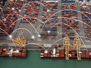 Logistics IT Solutions A port full of containers surrounded by a virtual network of logistics IT solutions