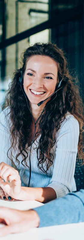 Online Marketing For Small Business A man and a woman working in a small business in the field of online marketing