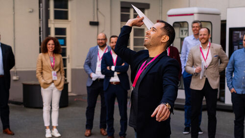 Digital Transformation in Banking & Insurance Industry People playing with paper planes at Digital Transformation in Banking & Insurance Industry