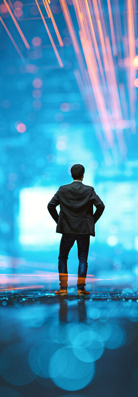 A businessman stands in a futuristic virtual city environment symbolizes monetizing data resources with big data analytics by T Business.