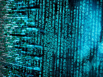 An abstract background with a lot of source code symbolizing big data analytics, a T Business solution.