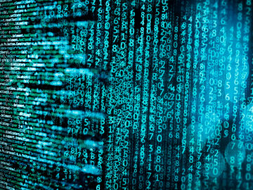 An abstract background with a lot of source code symbolizing big data analytics, a T Business solution.