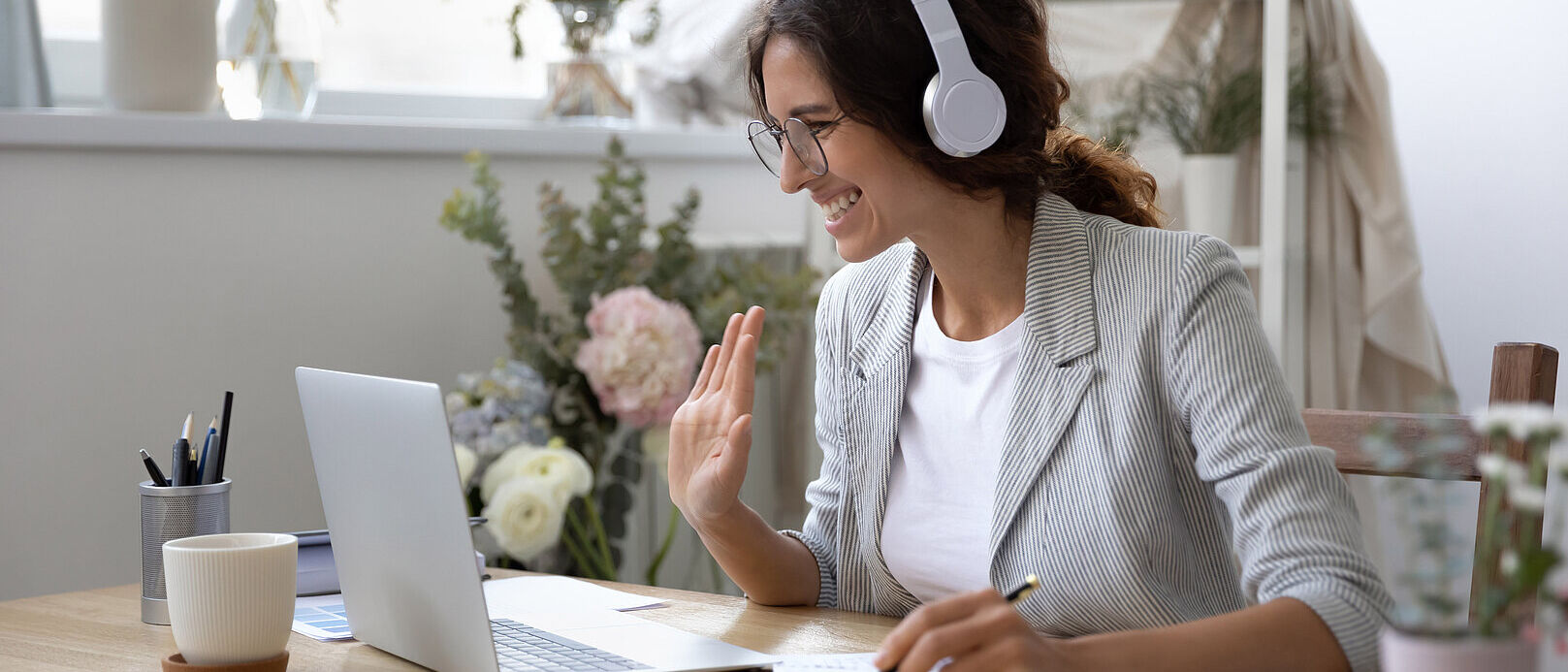 IT Telco Service Provider Woman looking for an IT telco service provider on her laptop