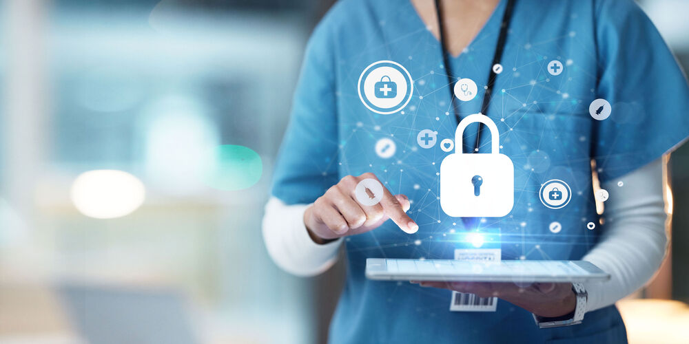 A nurse holding a tablet in her hands and a flying lock above it representing the SOC solutions by T Business Europe.