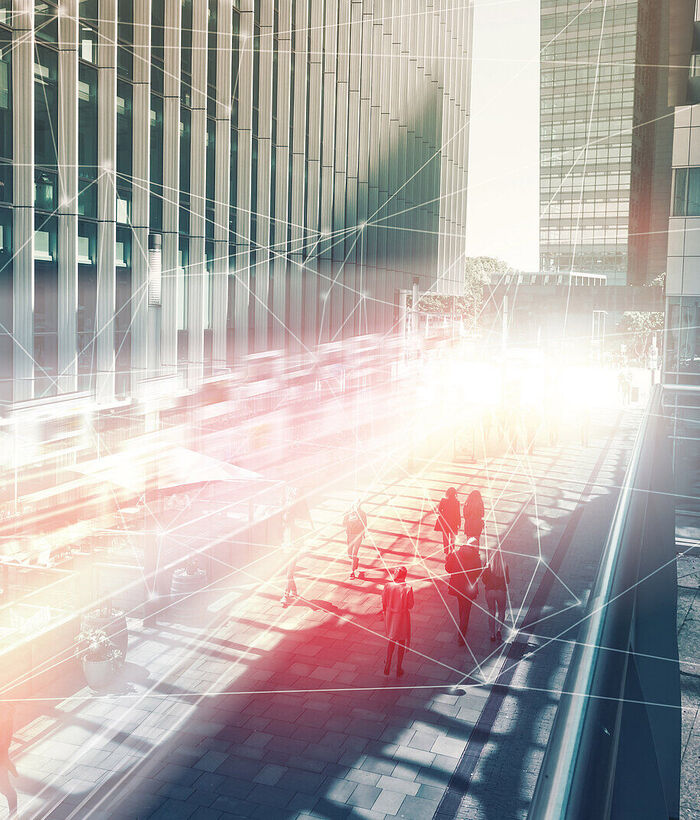 A busy street with yellow and red lights in a smart city