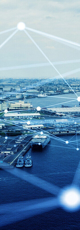 A stylized communications network is depicted over a port city to symbolize T Business' sustainable digitalization solutions that can be used to protect critical infrastructure.