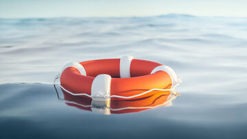 Business IT security A lifebuoy in the water symbolizes disaster recovery, a business IT security solution by T Business.