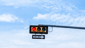 Cloud readiness A traffic light and a traffic sign symbolizing the secure cloud governance concept with cloud readiness, a T Business solution.